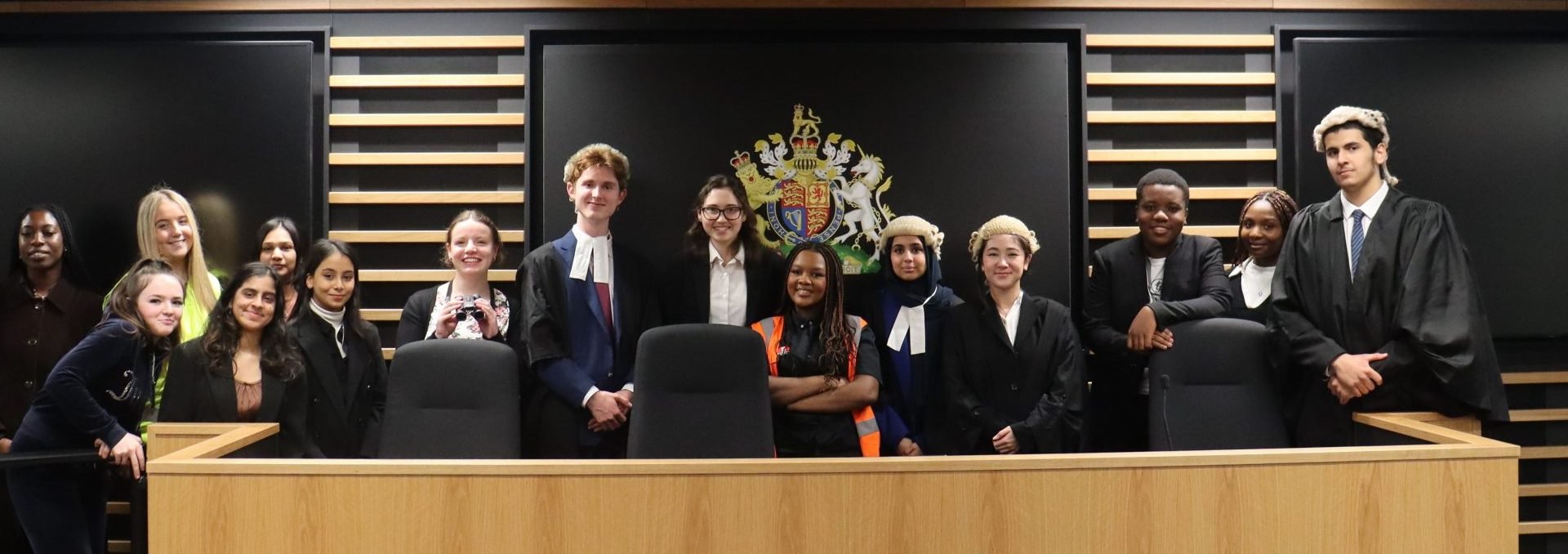 Loreto students dressed in barrister robes and wigs inside court