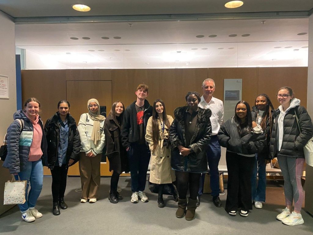 Mock Trial Team from Loreto College standing alongside Mr Justice Fordom