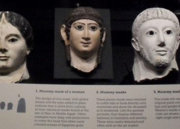 Various mummy masks exhibited at the Manchester Museum