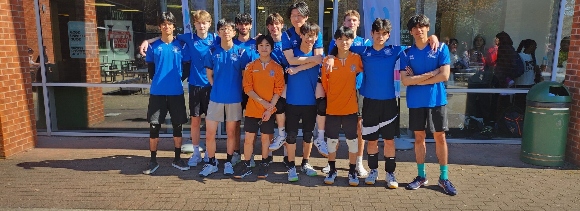 Loreto's male volleyball team photo taken outside the University of Nottingham.