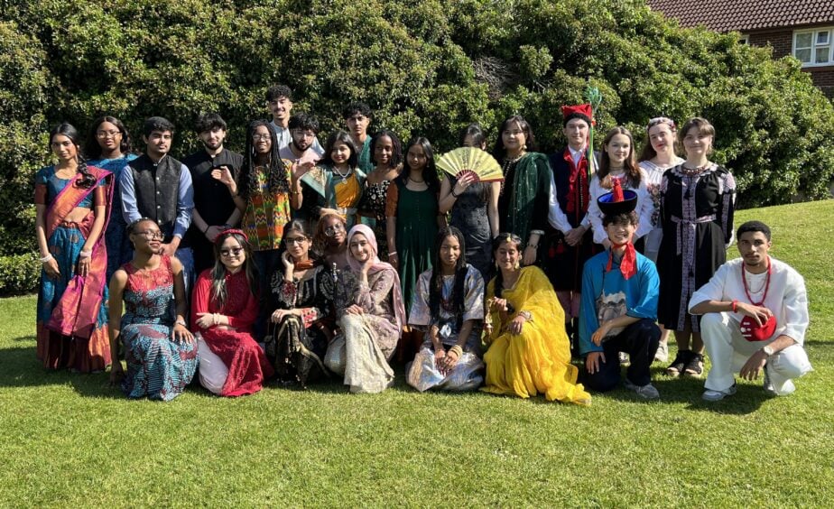 Students in traditional dress at Loreto College Manchester celebrating cultural diversity during Cultural Appreciation Day.