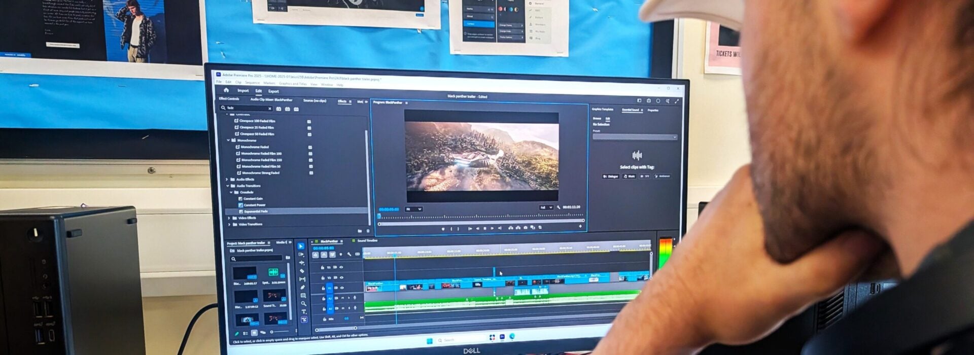 Student using Adobe Premiere Pro video editing software on a desktop computer during an Editing Club session at Loreto College.