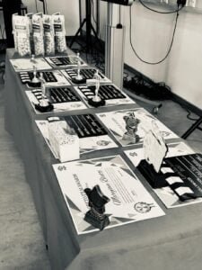 Film award trophies, certificates and prize displays prepared for the Loreto Film Awards ceremony.