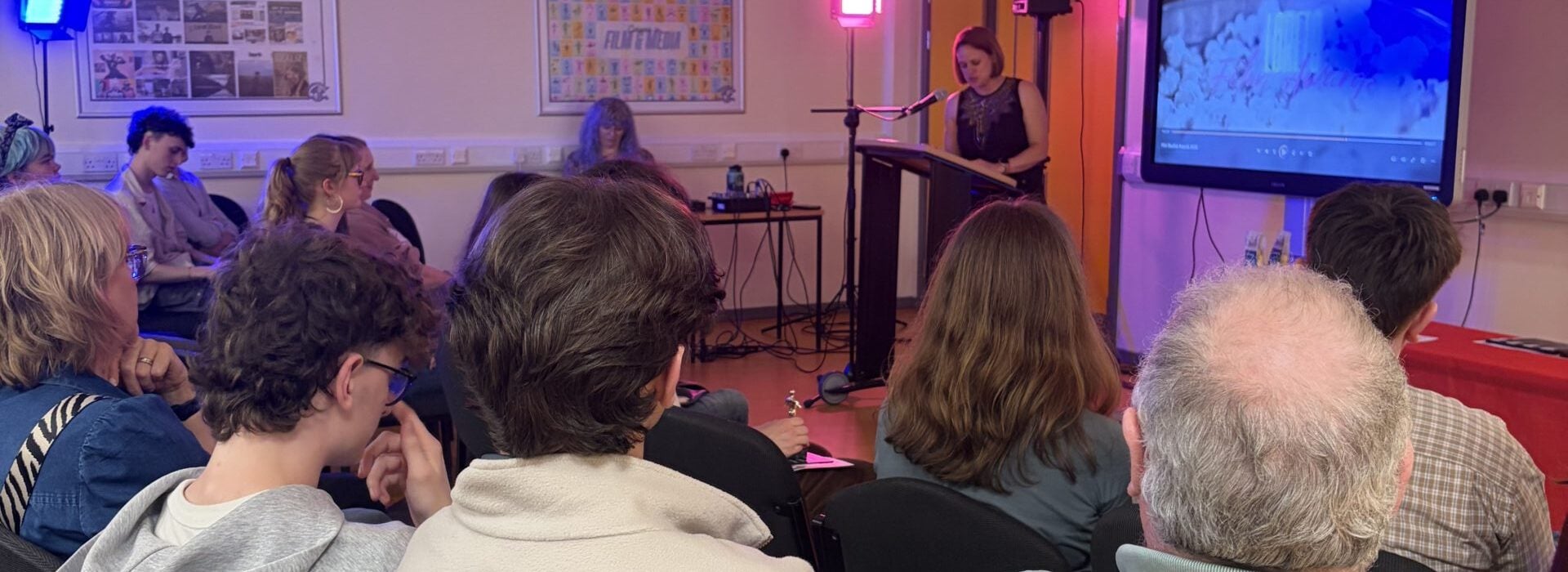 Audience members watch a presentation and film screening during the Loreto Film Awards 2026 ceremony at Loreto College.